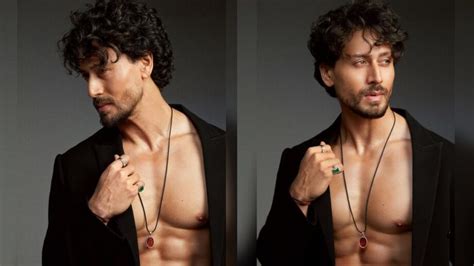 tiger shroff ignites sensuality in unbuttoned black shirt flaunts chiselled abs