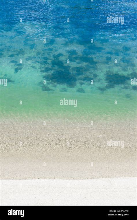Soft Wave Of Blue Ocean On Sandy Beach Background Stock Photo Alamy