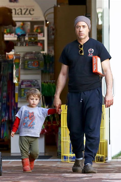Is the poster kid for the saying 'hard work and dedication merits rewards'. Robert Downey Jr. and his son Exton, toy shopping ...