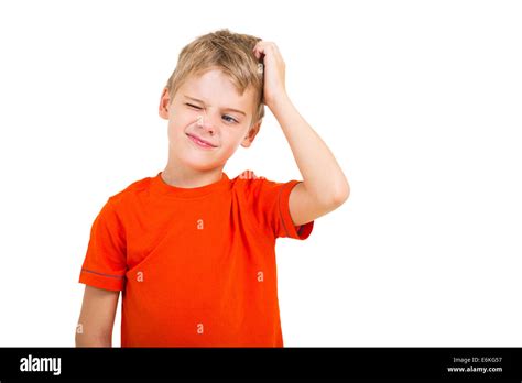 Young Boy Scratching His Head Isolated On White Stock Photo Alamy