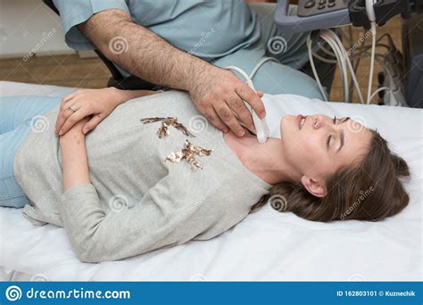 Ultrasound Examination At The Doctor Of A Young Girl Stock Image