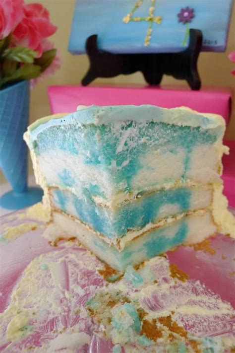 A Jello Poke Cake Made With Angel Food Cake Poked And Drizzled With Blue Jello And Once Set
