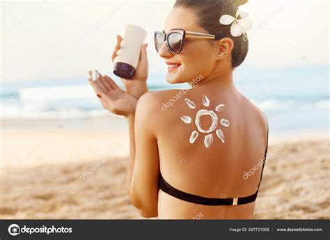 Woman Applying Sun Cream Tanned Shoulder Form Sun Sun Protection Stock Photo By Verona S