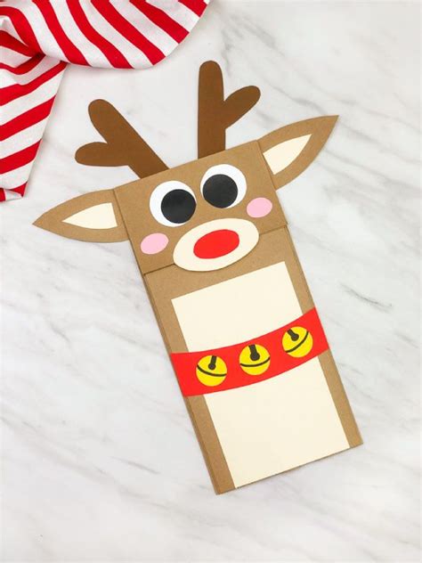 This Rudolph The Red Nosed Reindeer Is A Fun Puppet Craft Made From