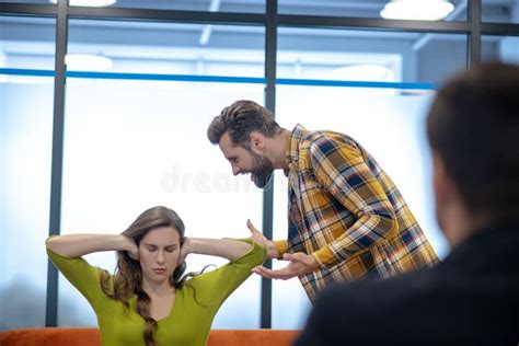 Young Man Angrily Yelling At His Wife Stock Photo Image Of Longhaired