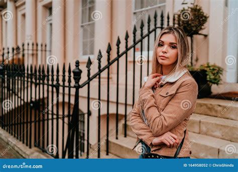 Portrait Charming Young Woman With Blonde Hair Street Style Stock