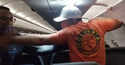 Watch Passengers Duct Taped Intoxicated Man To Seat After He Groped Flight Attendants