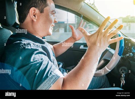 Impatient Driver Yelling Portrait Of Angry Driver Yelling In His Car