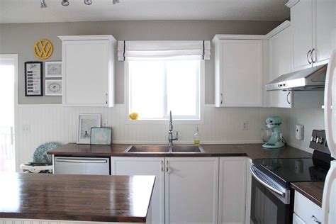 I'm sharing a peel and stick backsplash, painting. A Bright Modern Kitchen Under $500 | Hometalk