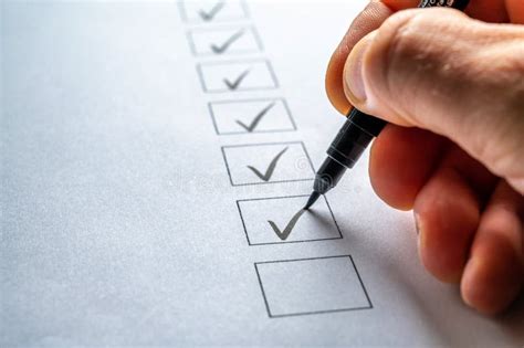 Completed Tasks Are Checked Off On A Checklist Stock Photo Image Of