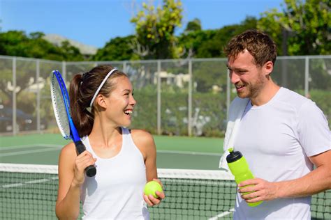 Tennis Sport Couple Relaxing After Playing Game