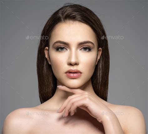 Portrait Of Beautiful Young Brunette Woman With Clean Face Stock Photo