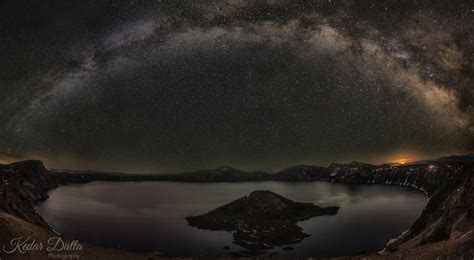 Milky Way Arching Over Crater Lake On A Cold Dark Night By Kedar Datta