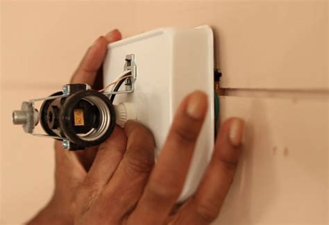 Repeat for the remaining light sockets. How to Install Vanity Lights - The Home Depot