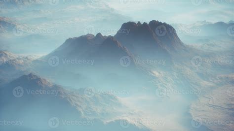 Distant Mountain Range And Thin Layer Of Fog On The Valleys 5769686