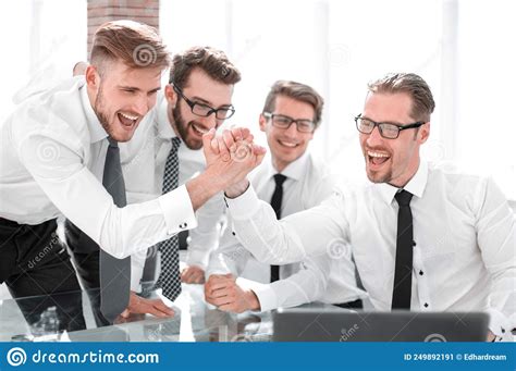 Employees Giving Each Other A High Five Stock Image Image Of Meeting