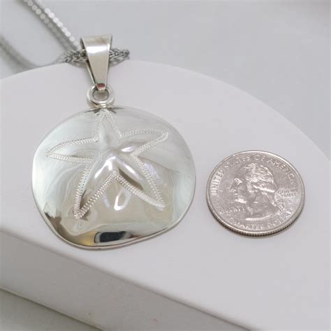 Large Sterling Silver Sand Dollar Pendant From