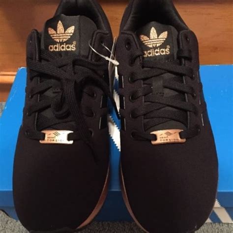 Buy and sell authentic adidas nmd r1 shoe palace black and gold shoes eh2749 and thousands of other adidas sneakers with price data and release dates. adidas Shoes | Black And Gold Adidas Zx Flux | Poshmark