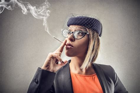 Premium Photo Portrait Of A Smoking Woman