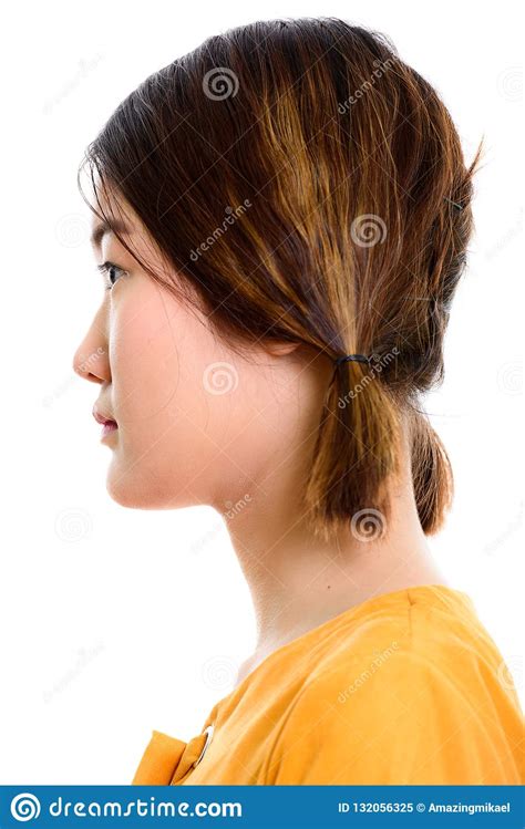 Profile View Of Face Of Young Beautiful Asian Woman Stock