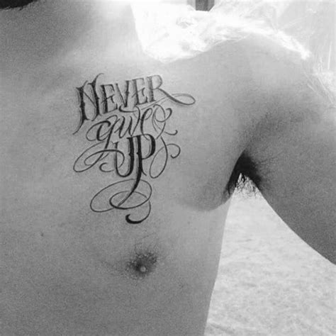 Custom letting 'never give up' inner forearm tattoo. 60 Never Give Up Tattoos For Men - Phrase Design Ideas