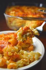 We're talking decadent creamy macaroni with the most incredible cheese sauce. Baked Macaroni and Cheese | A Taste of Madness