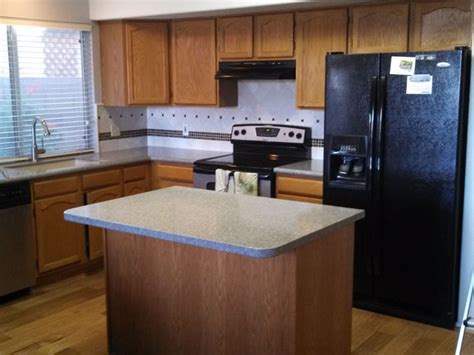 They then installed our kitchen, laundry room and guest bath cabinets, counter tops, backsplash and under/over cabinet lighting while we were on vacation. Cabinet Refinishing-Tempe Arizona-Grapevine Cabinets