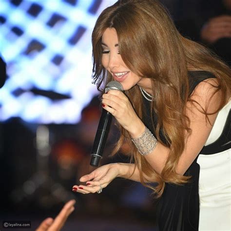 صور إطلالة ساحرة لنانسي عجرم في حفل القاهرة