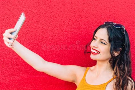 Portrait Of A Happy Young Woman Taking Selfie Stock Photo Image Of