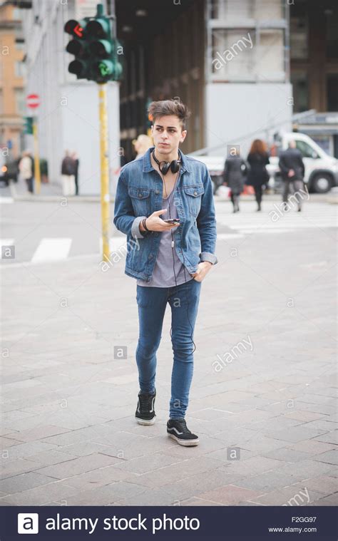 Young Handsome Alternative Dark Model Man Walking Trough