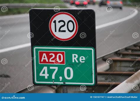 Distance Sign At Motorway A20 Heading Gouda With Attention Sign For