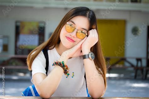 Portrait Of Thai Chinese Adult Glasses Beautiful Girl Denim Blue Relax