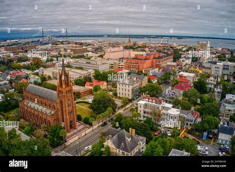 Beautiful Aerial View Of Charleston With Dense Buildings Under A Cloudy