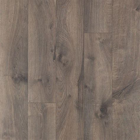 The grey, tan, blue and white color patterns provide a unique design that give a coastal feel or modern loft vibe. Pergo XP Southern Grey Oak 10 mm Thick x 6-1/8 in. Wide x ...