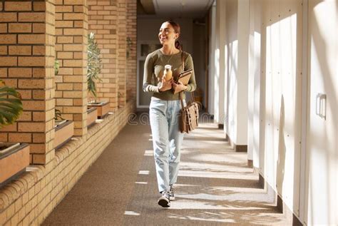 Woman Student And University Hallway With A Person Walking Ready For