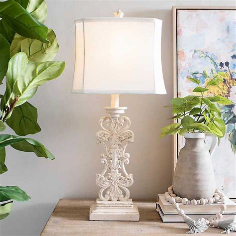 For a simple but sophisticated addition to your home, pick up the davis table lamp from threshold. Distressed Cream Scroll Table Lamp from Kirkland's ...