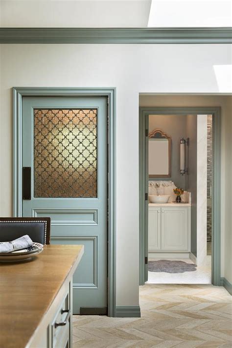 The gray cabinets with glass doors and the horizontal stripes give us a vibe of beach kitchen! Cream Beveled Kitchen Backsplash Tiles - Transitional ...