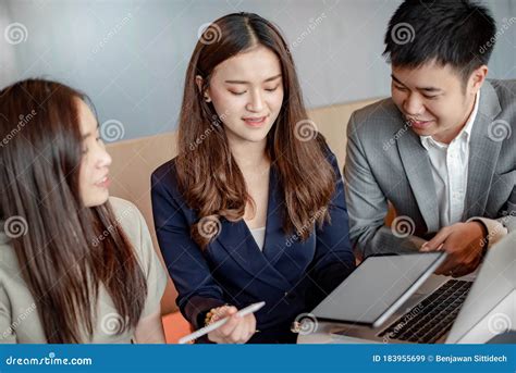Asian Colleagues Discussing In Office Meeting Room Stock Image Image