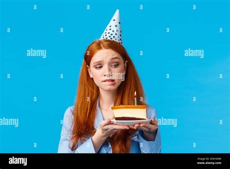 Attractive Caucasian Redhead Woman In Birthday Cap Holding Delicious Tasty B Day Cake With Lit