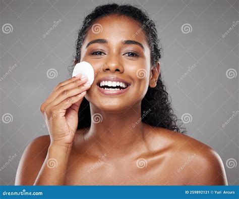 Skincare Beauty And Portrait Of Black Woman With Cotton Pad To Cleanse
