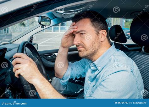 Worried Man Driving His Car And Having Bad Car Accident Stock Image