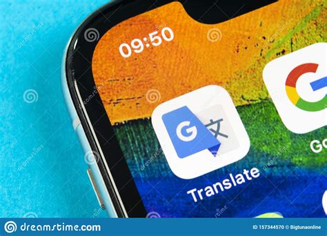 Translate between 108 languages by typing • tap to translate: Google Translate Application Icon On Apple IPhone X Screen ...