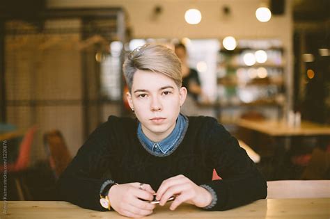 Portrait Of Young Lesbian Woman At Coffee Shop By Alexey Kuzma