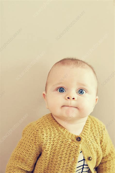 Portrait Of Blue Eyed Baby Boy Pulling A Face Stock Image F0211025