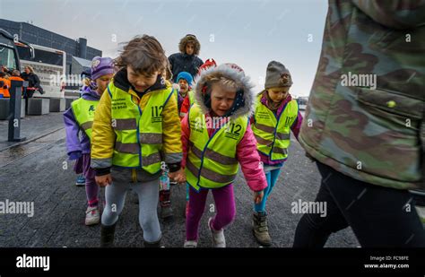 Children Walking In The Rain Reykjavik Iceland Stock Photo Alamy