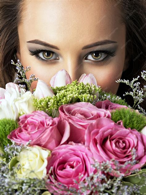 Free Photo Closeup Face Of Beautiful Girl With Flowers Young Attractive Woman Holds The