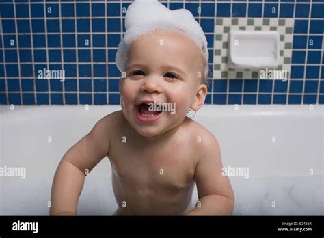 Baby Taking A Bath Stock Photo Alamy