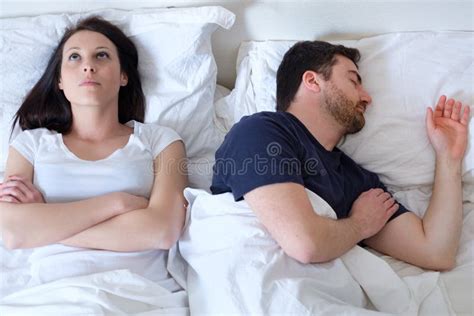 Sad And Thoughtful Woman Awake While Husband Is Sleeping In Bed Stock Image Image Of Breakup