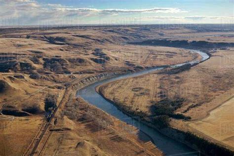 Aerial View Of Bow River Winding Around The Foothills In Autumn