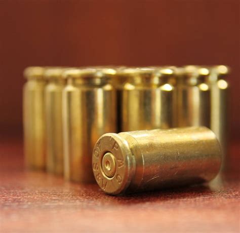 Size 40 Spent Bullet Shell Casings Ammo Set Of 12 Pieces